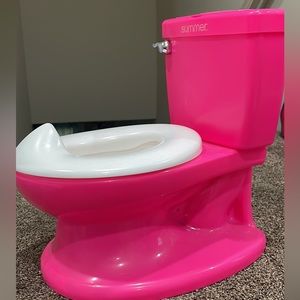 Pink and White potty chair with realistic flushing sounds